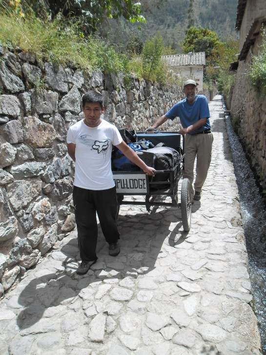 Gregorio in the front. We tried to keep the luggage from dumping into the irrigation ditch.